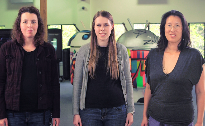 Three women standing side-by-side