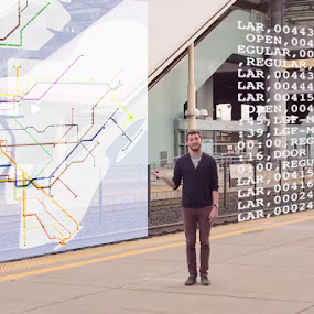 Instructor Dave Holtz shows subway map and data