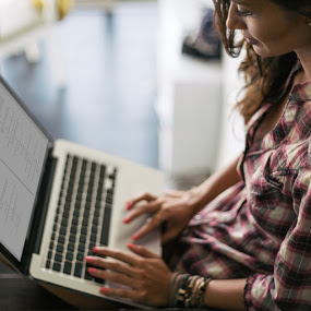 woman studying on laptop